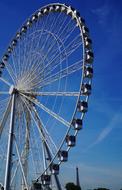 ferris wheel in paris on a sunny day