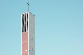 pink tower on blue sky background