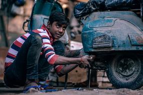 Kid motorcycle repairs