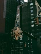 golden snowflake, christmas decoration in downtown