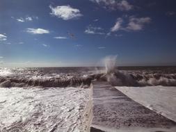 splashing water by the beach