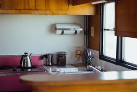 wooden kitchen with utensils