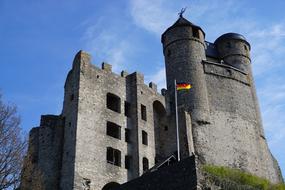 Beautiful old castle with German flag in Greifenstein, Germany