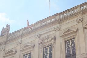 facade of a historic building in a solar haze