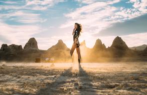 girl and mountains at sunlight