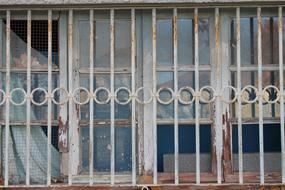 old barred window close up