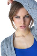 young woman in a blue knitted sweater