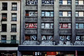 building facade and graffiti on the windows