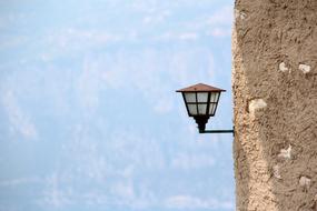 lantern on an old stone wall