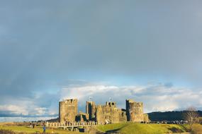 photos of tourists at the castle walls