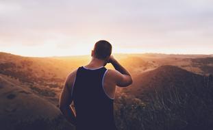 Guy looking at scenic landscape