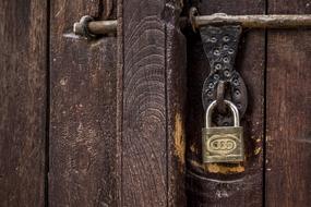 Padlock on wooden Door