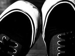 black sneakers photographed from above