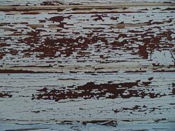 Pattern on the brown wood with the white paint