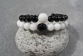 Hand jewelry with white and black beads
