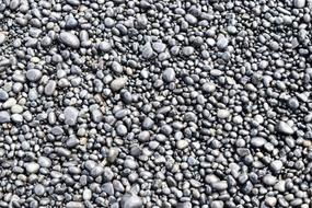 Pebbles Rocks Wet grey sea