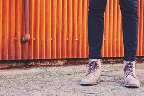 Boots and Jeans Denim and orange wall