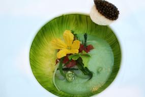 flowers in a green plate