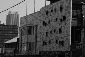 Black and white cityscape with the building, with the drawings