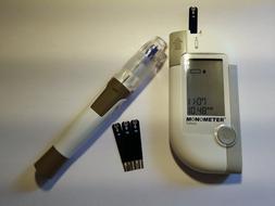 Diabetes manage devices, insulin syringe and monitor