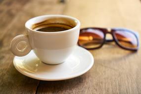 Sunglasses and cup