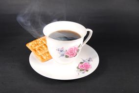 hot cup with cookies