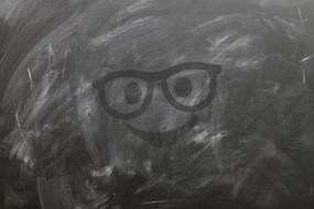 painted face on school chalkboard