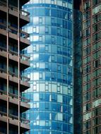reflection of the sky in a skyscraper with glass facades