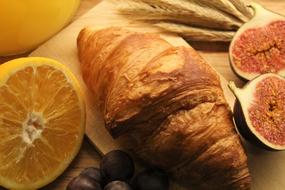 delicious croissant with citrus