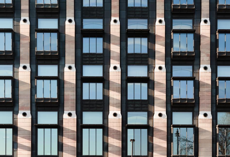 Beautiful beige modern building with windows
