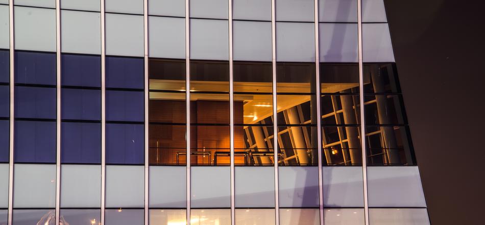 Building with the windows, and colorful light inside