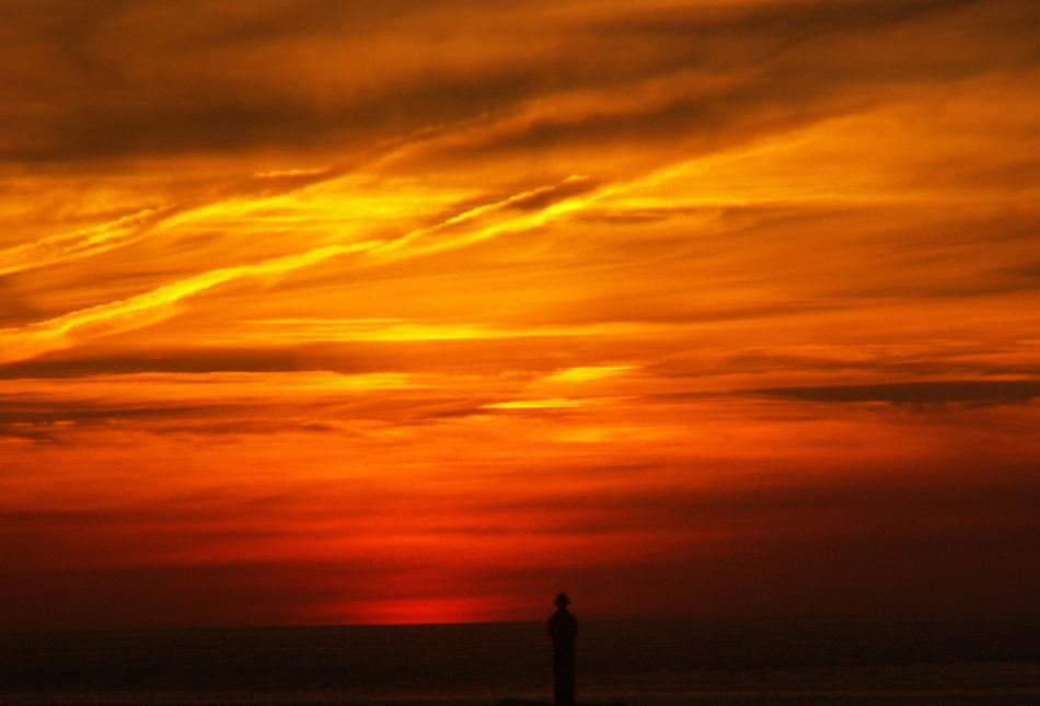 orange sunset with a man