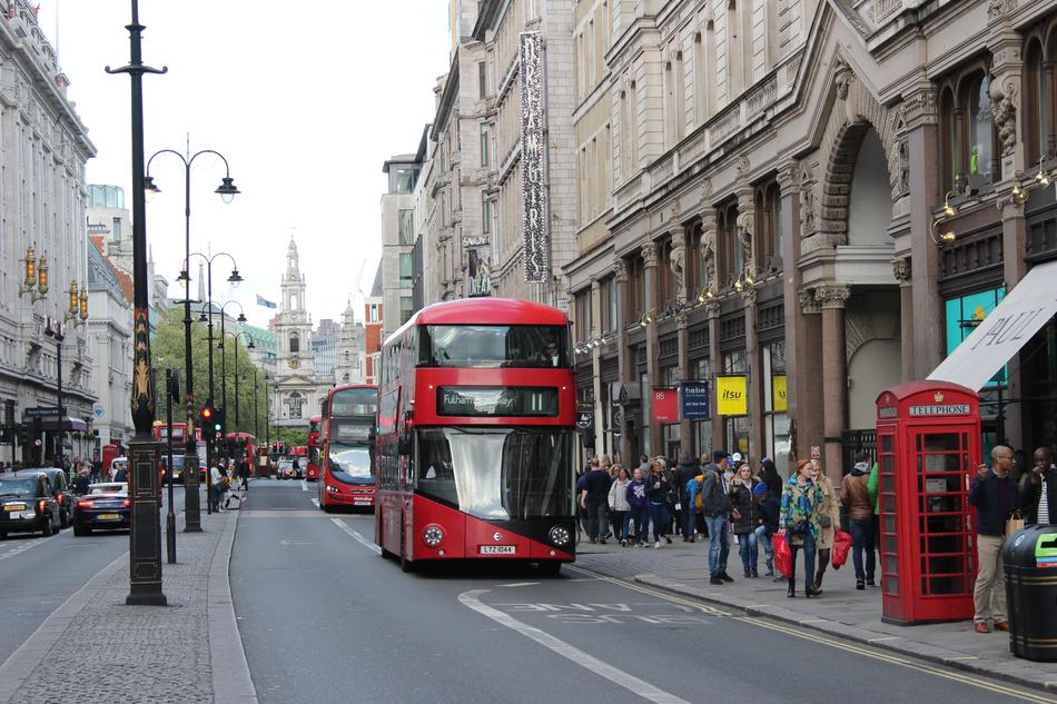 London Shopping street and red bus