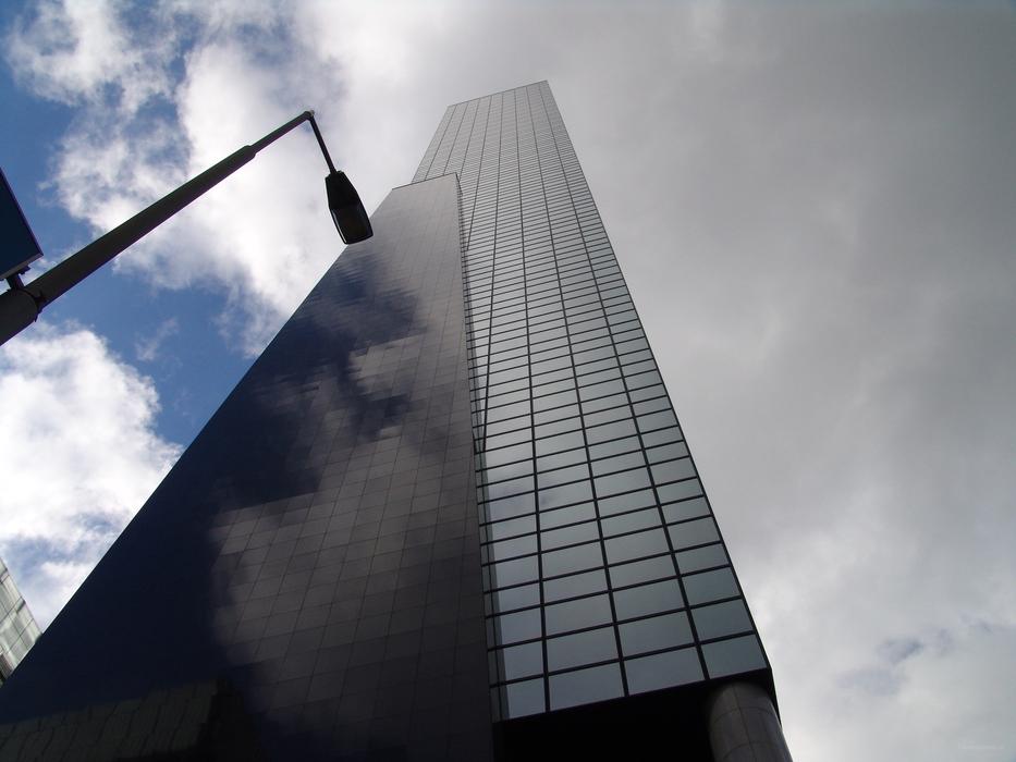 skyscraper under the sky with clouds in rotterdam