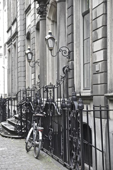 bike near the building in the hague in monochrome