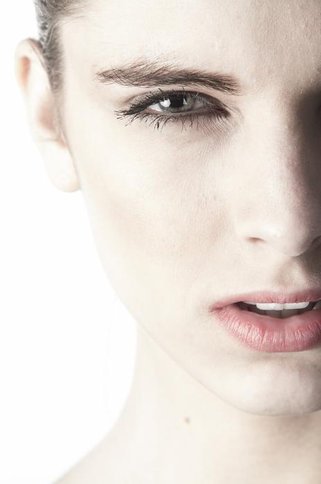 Beautiful young Woman face view