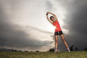 Woman in Orange Sports clothes