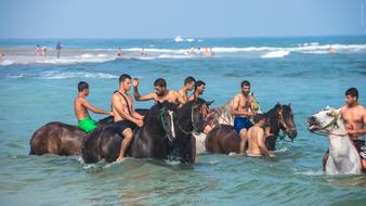 man on horseback at sea