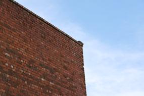 Brick Building Wall red blue sky