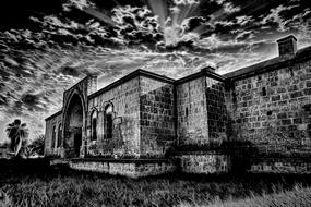 black and white photo of a stone building