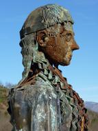 rusty metal female sculpture in the Pyrenees