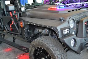 Beautiful and colorful Afterfx Custom Jeep, with the lights