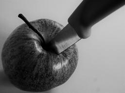 knife in an apple