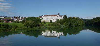 Monastery Building Reflection in the river on a sunny day