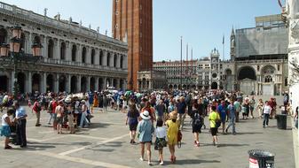 tourists in the square in venice on a sunny day