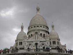 tourists near historic architecture in paris