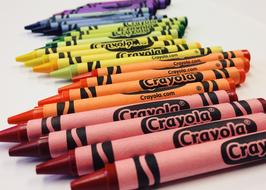 Colorful and beautiful "Crayola" crayons, on the white surface