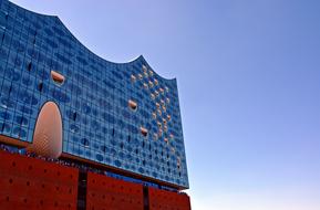 Beautiful and colorful Elbe Philharmonic Hall in Hamburg, Germany, at blue, gradient sky