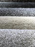 Close-up of the colorful and soft, beautiful carpets, in light