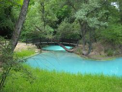 footbridge across River in Park